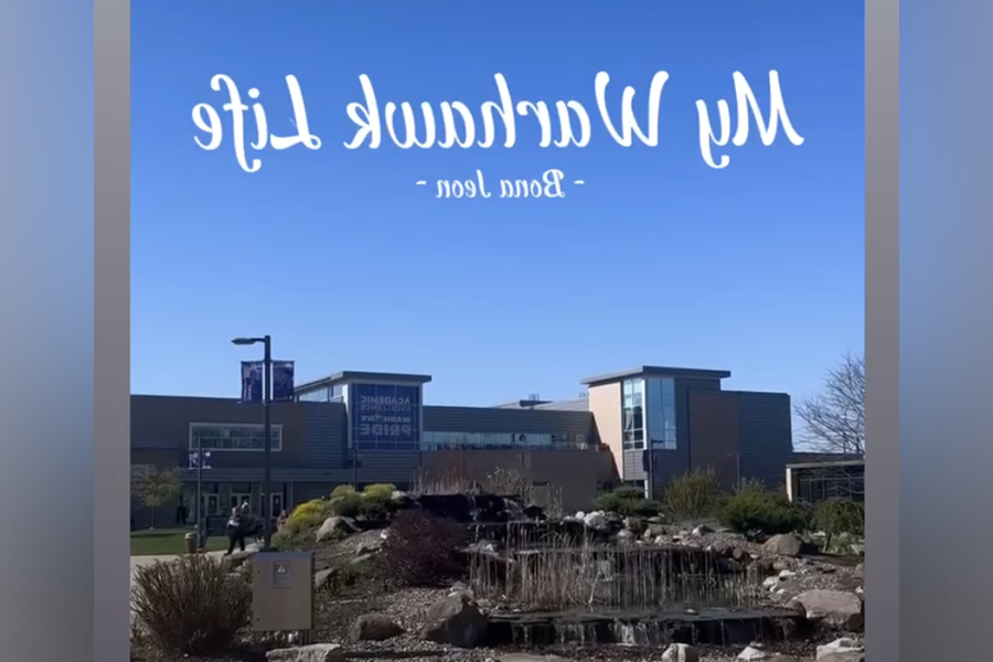 A screenshot from an Instagram story showing blue sky and the University Center with a title of My Warhawk Life written on the top.